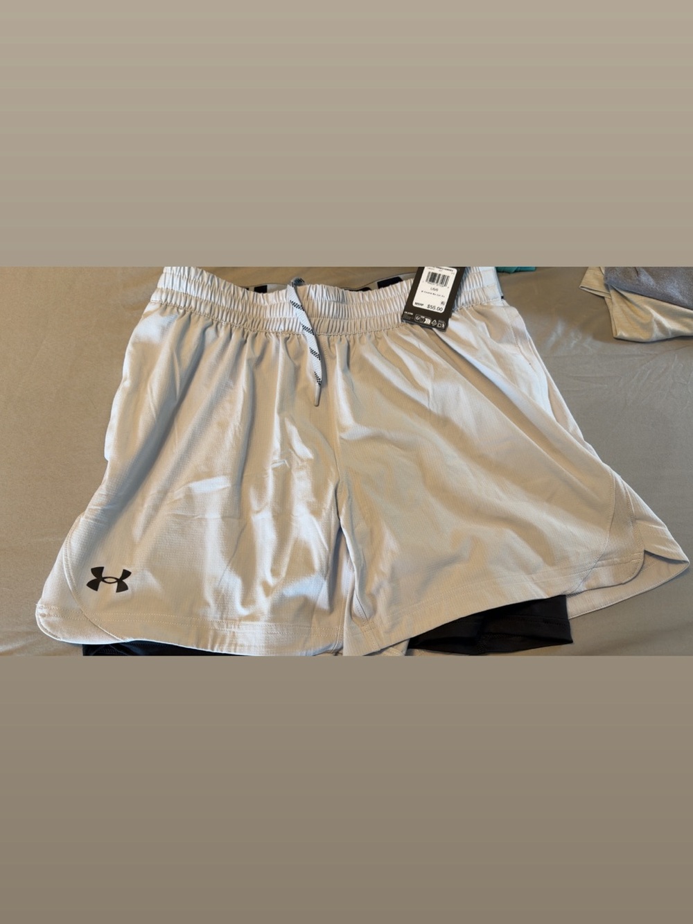 Under Armour Men's Light Gray Athletic Shorts with Black Logo